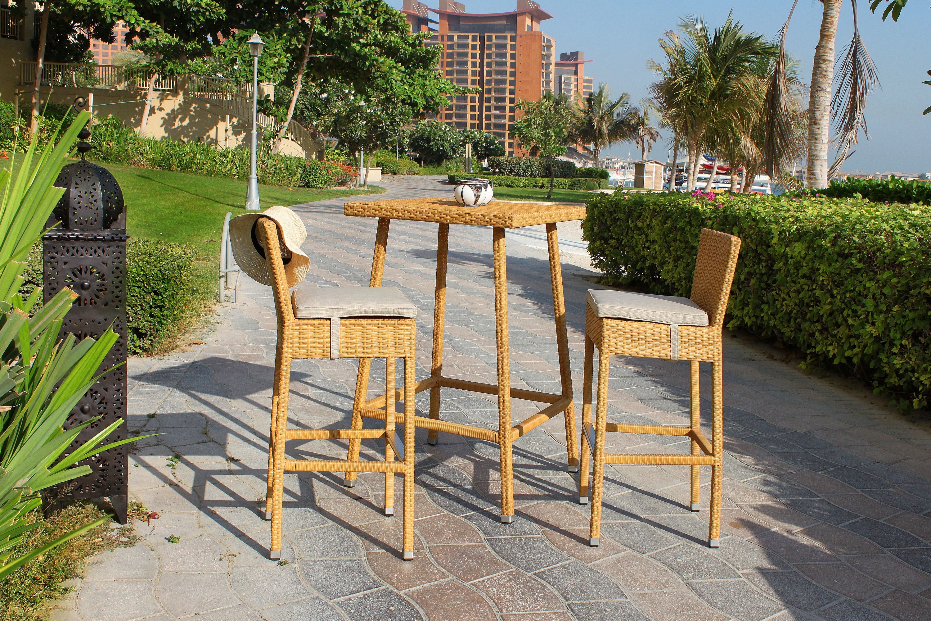 Outdoor high top table and bar stools